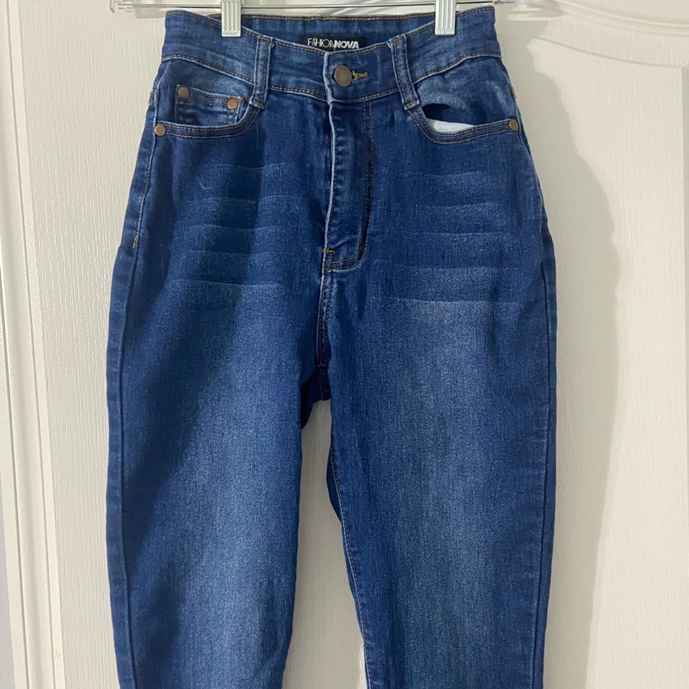 Fashion nova barley worn high rise jeans.